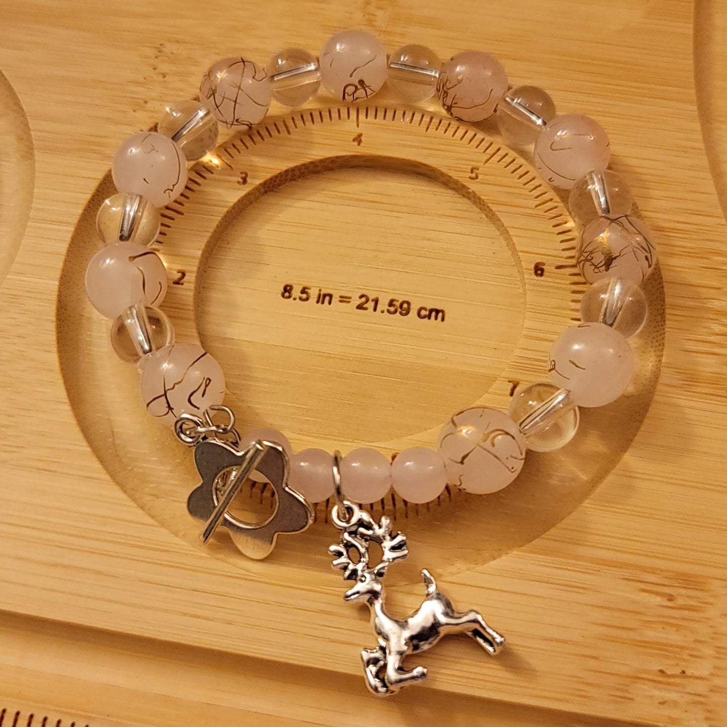 Pink Glass Bead Bracelet with Reindeer Charm