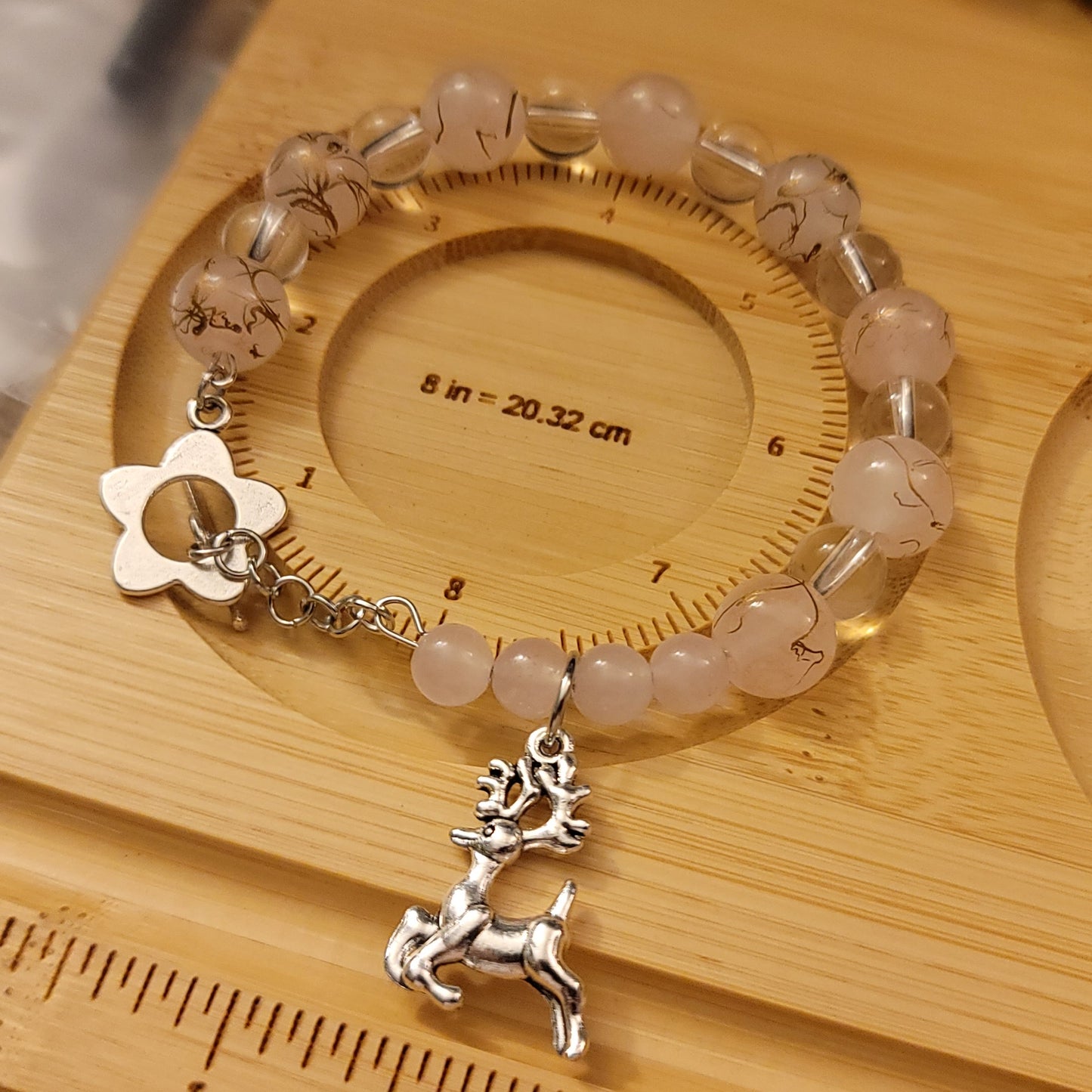 Pink Glass Bead Bracelet with Reindeer Charm